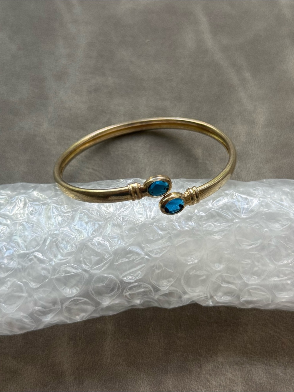 Gold Tone Open Cuff Bracelet with Blue Gemstones